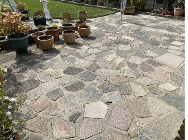 Crazy-paved area number 2 clean after being jet washed